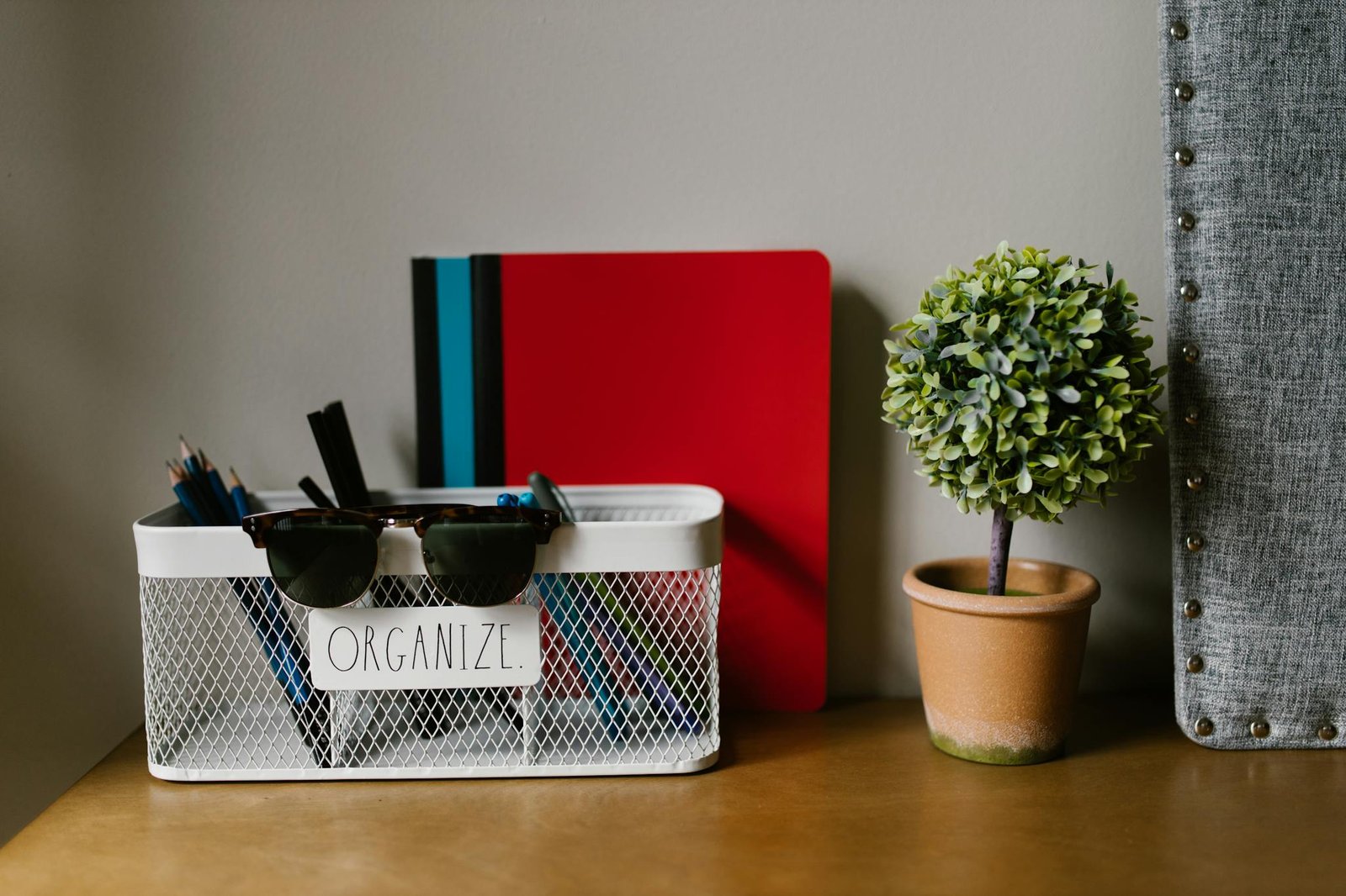 A Tidy Workspace Featuring A Basket With