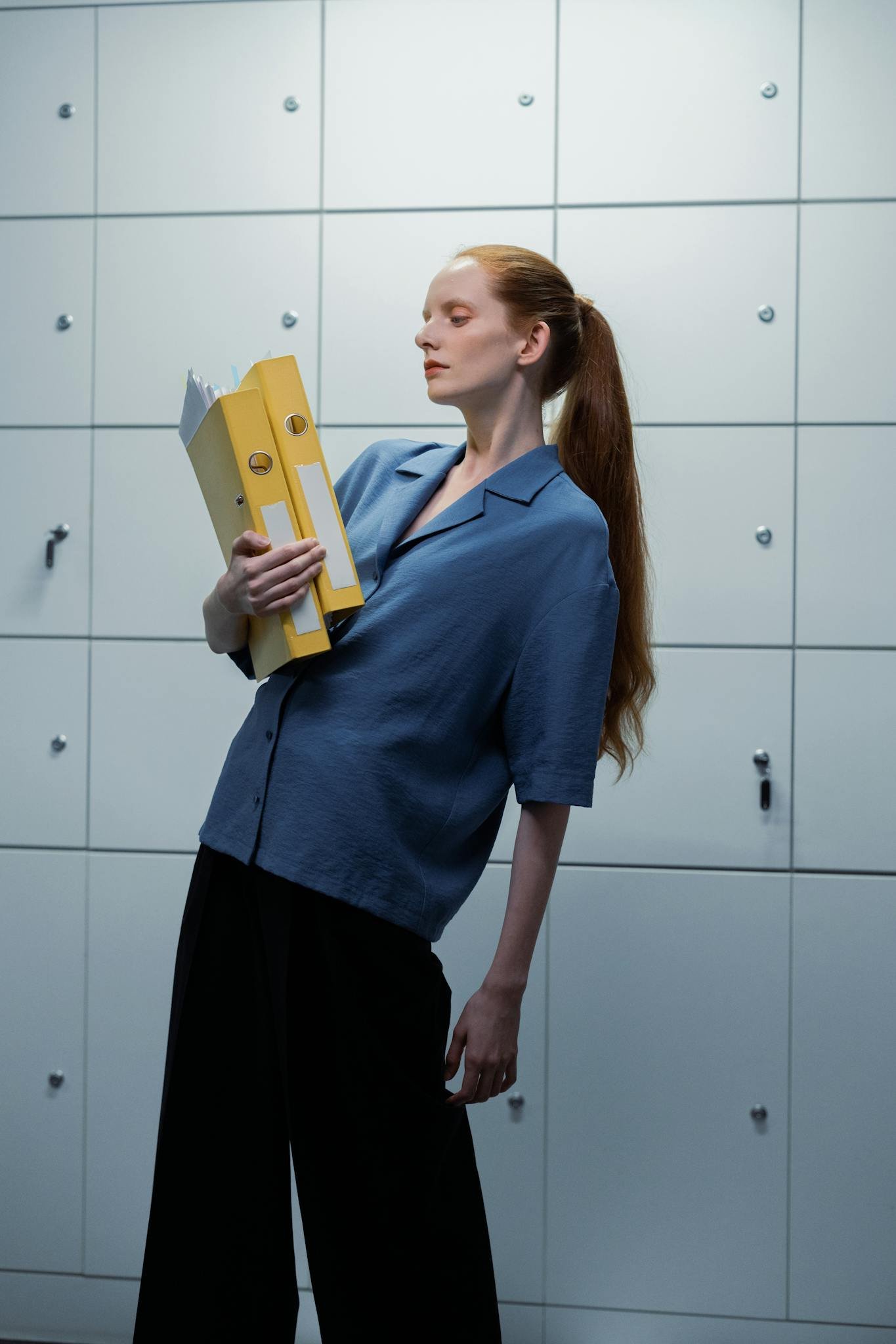 Confident Woman With Long Hair Holding Yellow
